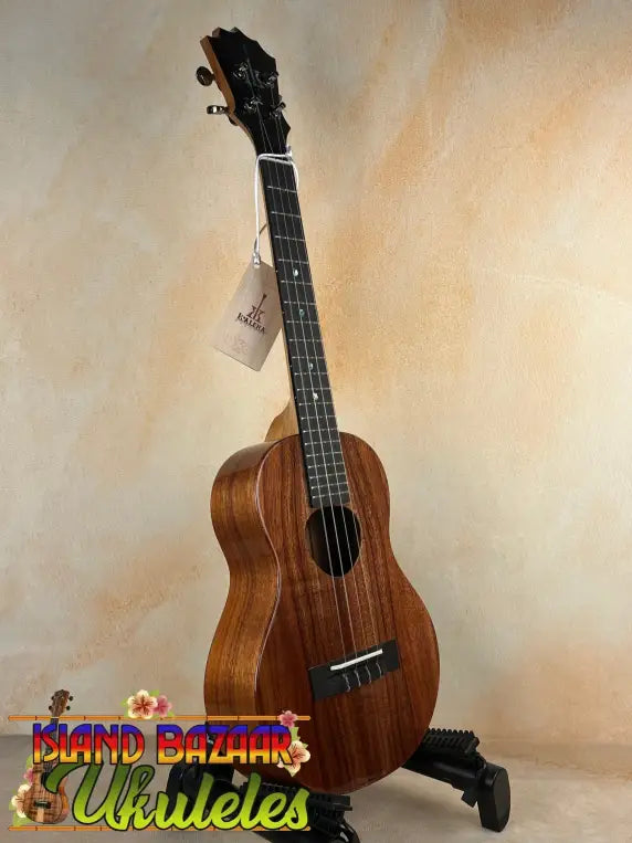 Brown wooden KoAloha KTM-00 Tenor Ukulele for authentic Hawaiian sound and rich tone