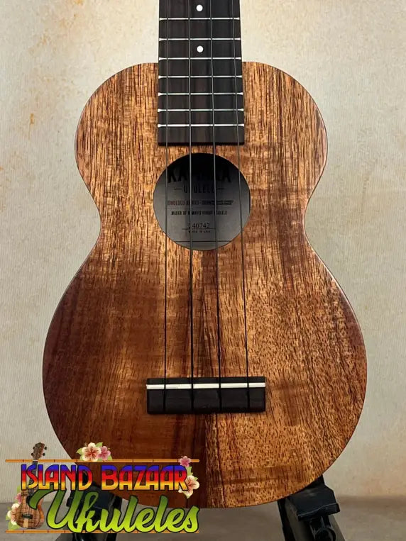 Beautiful Kamaka HF-1 Soprano Ukulele with solid koa wood grain and black fretboard