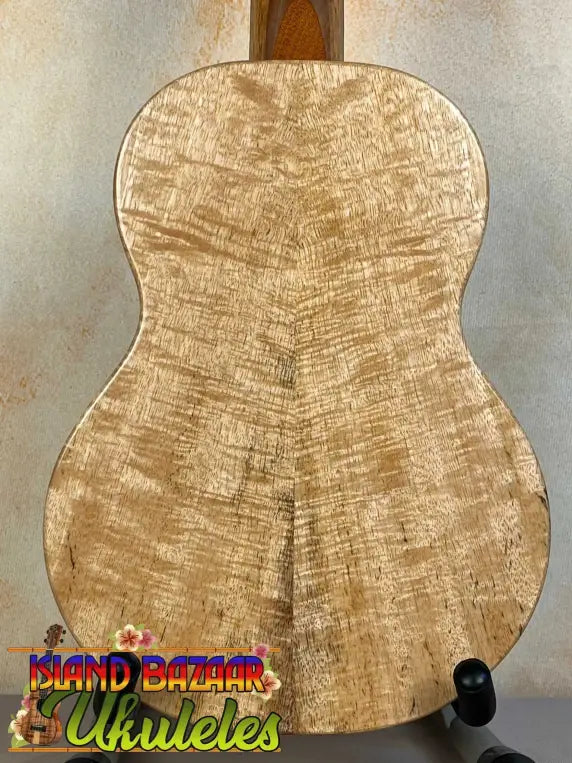 Acoustic guitar back panel of figured maple on KoAloha KTM-00 Mango Tenor Ukulele