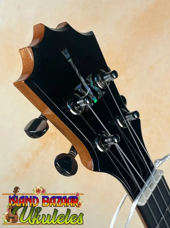 Ukulele headstock with tuning pegs on a KoAloha KTM-00 Tenor Ukulele with authentic Hawaiian sound