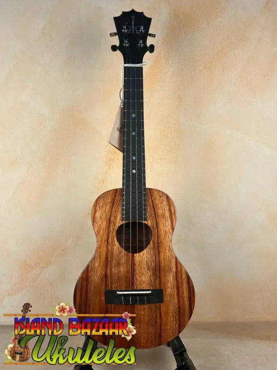 Wooden ukulele with black fretboard from KOAloha KTM-00 Tenor with solid Hawaiian koa and authentic Hawaiian sound