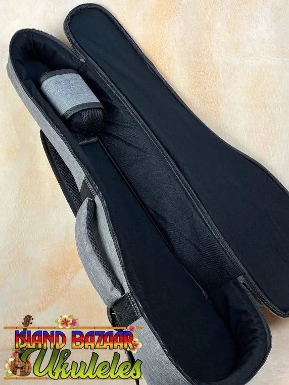 Black padded violin case with gray trim for Concert Acacia Ukulele Beginners Bundle