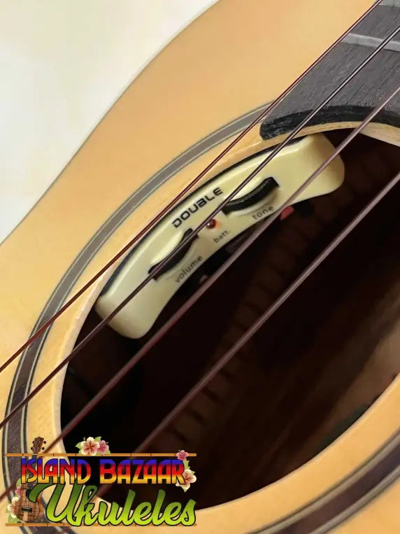 Acoustic guitar soundhole with strings and pickup on Flight Sophia Soundwave Tenor Uke