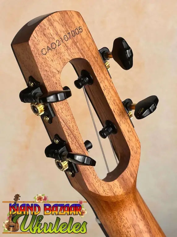 Wooden guitar headstock with black tuning pegs on Flight Voyager Tenor Ukulele