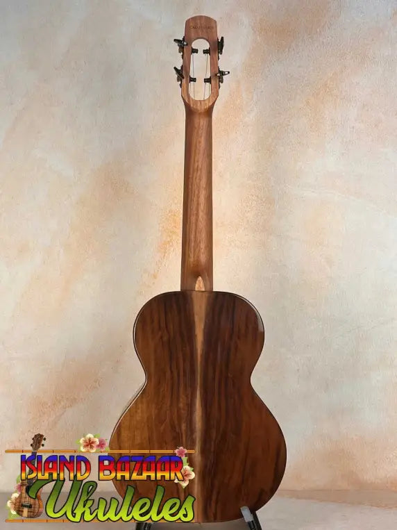 Wooden acoustic guitar with rich brown finish for Flight Voyager Tenor Electro-Acoustic Ukulele