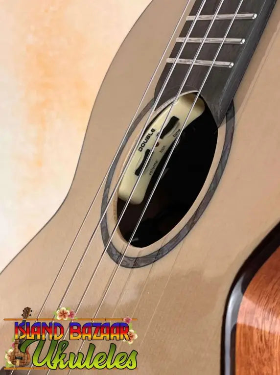 Acoustic ukulele with strings and sound hole of Flight Voyager Tenor Electro-Acoustic