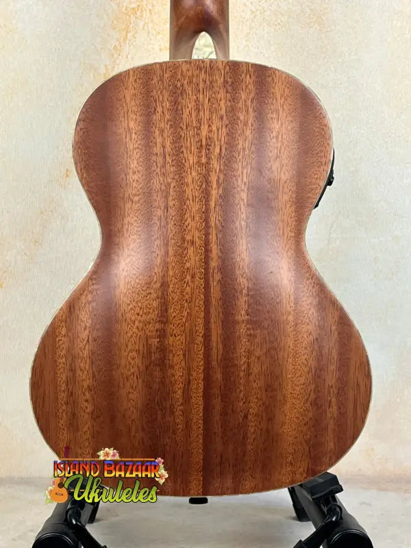 Acoustic guitar with rich brown back, showcasing Kala Archtop Tenor Ukulele KA-JTE-BKGN