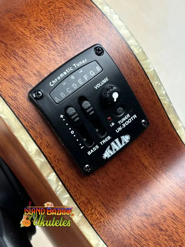 Guitar preamp and equalizer control on Kala Archtop Tenor Ukulele with classic design