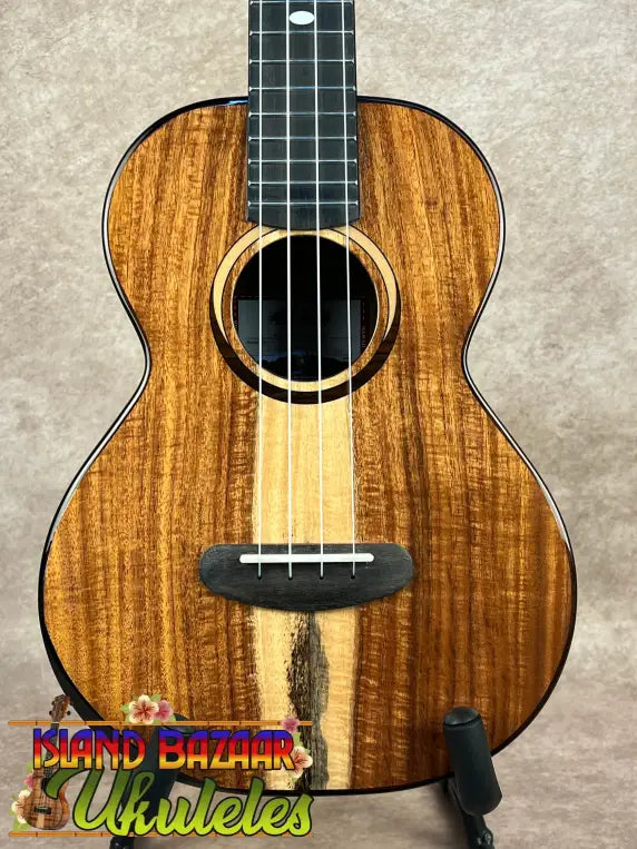 Acoustic tenor ukulele from Kala Contour Series with solid acacia wood and rich brown finish