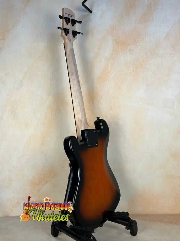 Electric bass guitar in sunburst finish, part of Kala Solid Body 4-String Tobacco Burst Fretted U•BASS® Ukulele