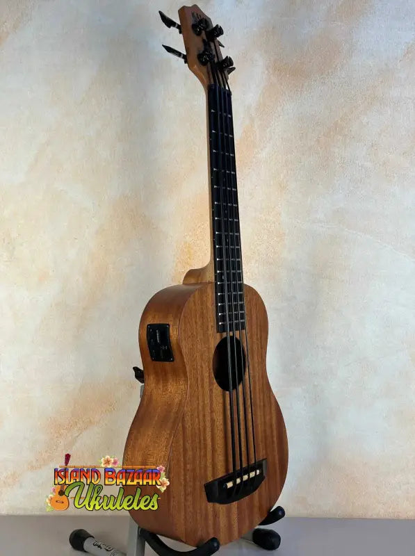 Wooden Kala U-Bass Nomad acoustic-electric bass ukulele with four strings and pickup