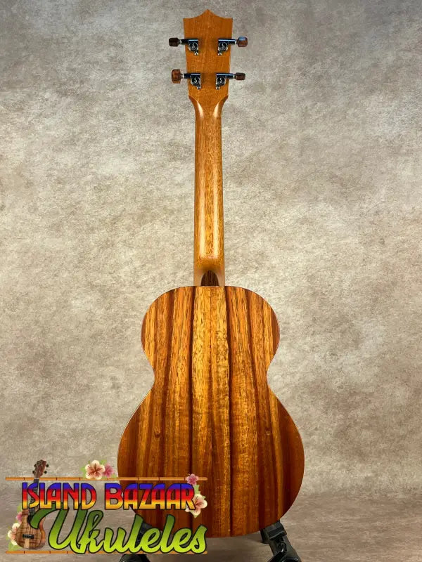 Wooden ukulele back showcasing Kamaka HF-3 Tenor design on the Kamaka HF-3 Ukulele