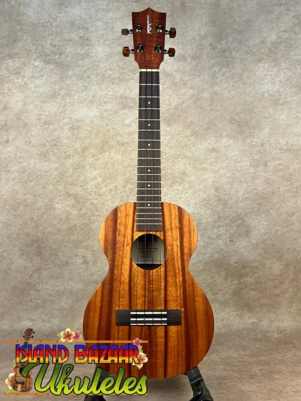 Brown wooden Kamaka HF-3 tenor ukulele for sale, solid koa classic instrument
