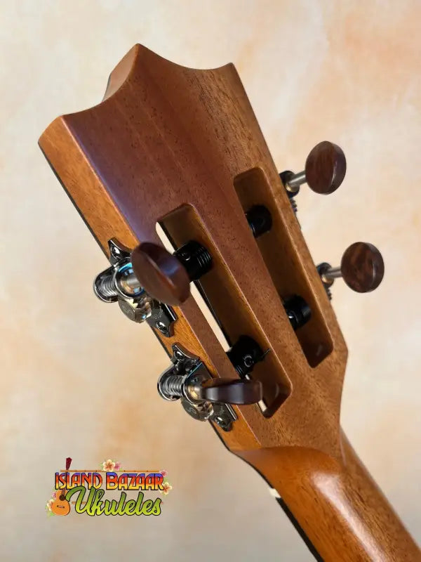 Wooden guitar headstock with tuning pegs on Kamaka HF3-D2i Tenor Uke Deluxe