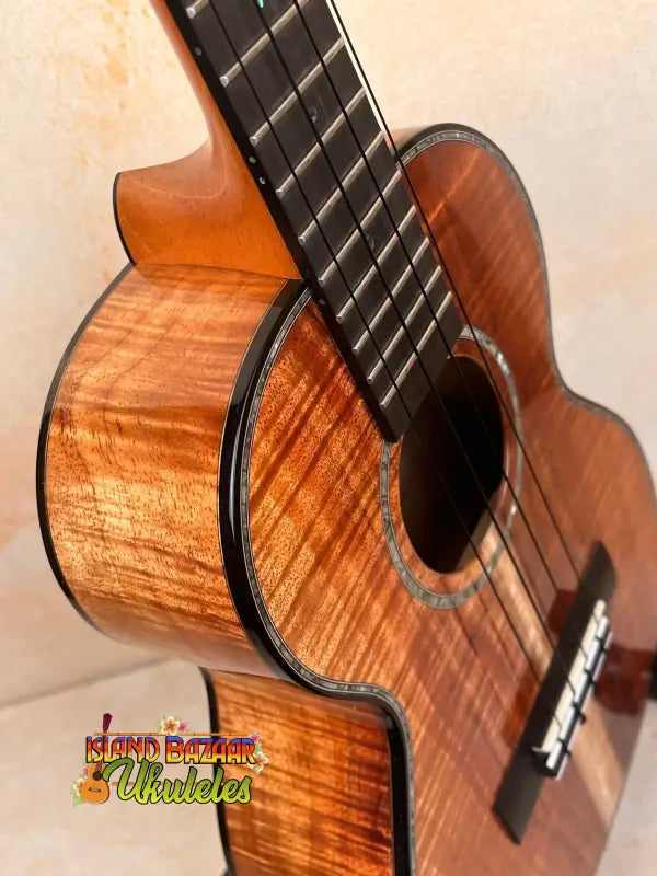 Beautiful Koa wood Kamaka HF3-D2i Tenor Uke with glossy finish and black binding
