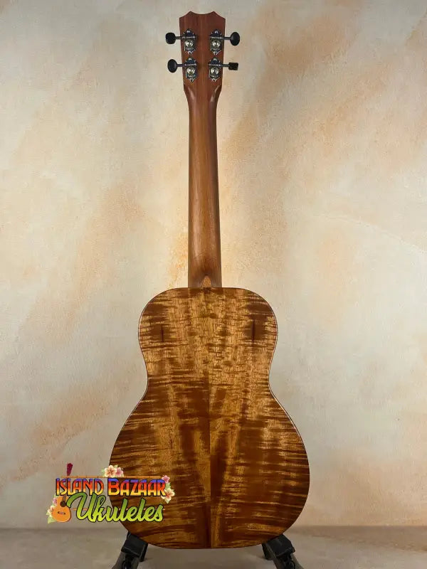 Wooden ukulele back showing the Kanileʻa D-1 T Pro Tenor Ukulele with solid Hawaiian koa