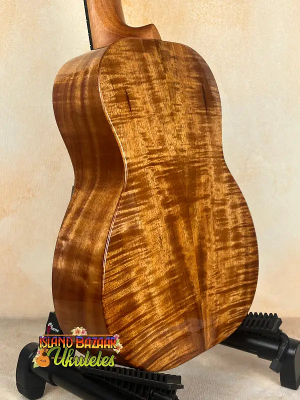 Wooden ukulele with figured back from Kanileʻa D-1 T Pro in solid Hawaiian koa