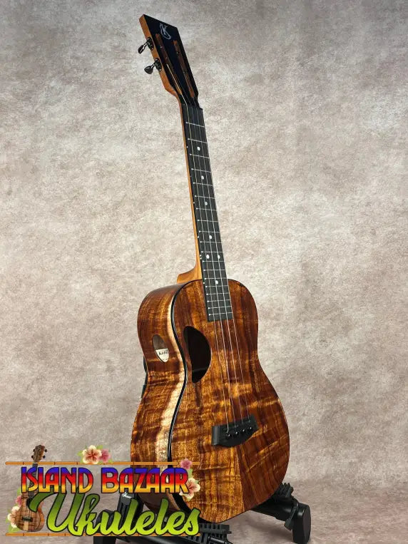 Kanile’a DK-T Pro tenor ukulele with natural koa finish and black binding