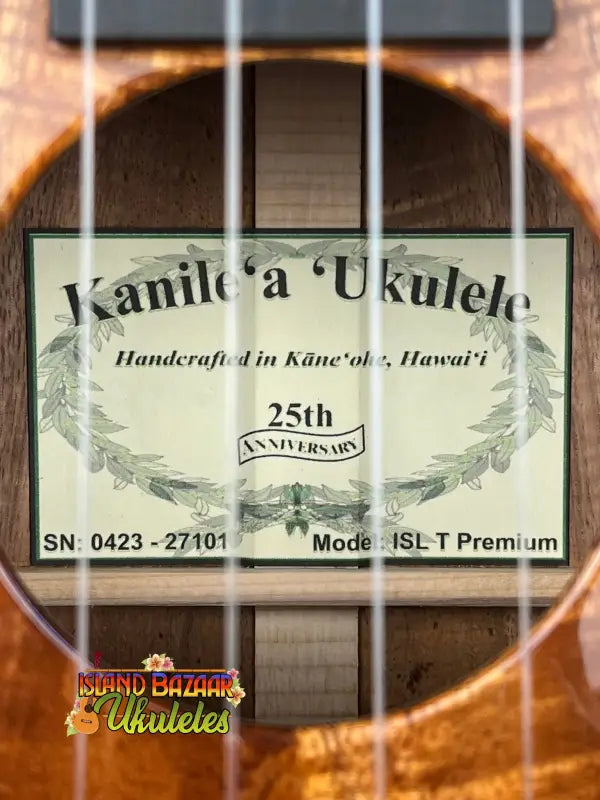 Kanile’a Hawaiian Islands Tenor Ukulele label seen through the sound hole, Premium Koa Wood
