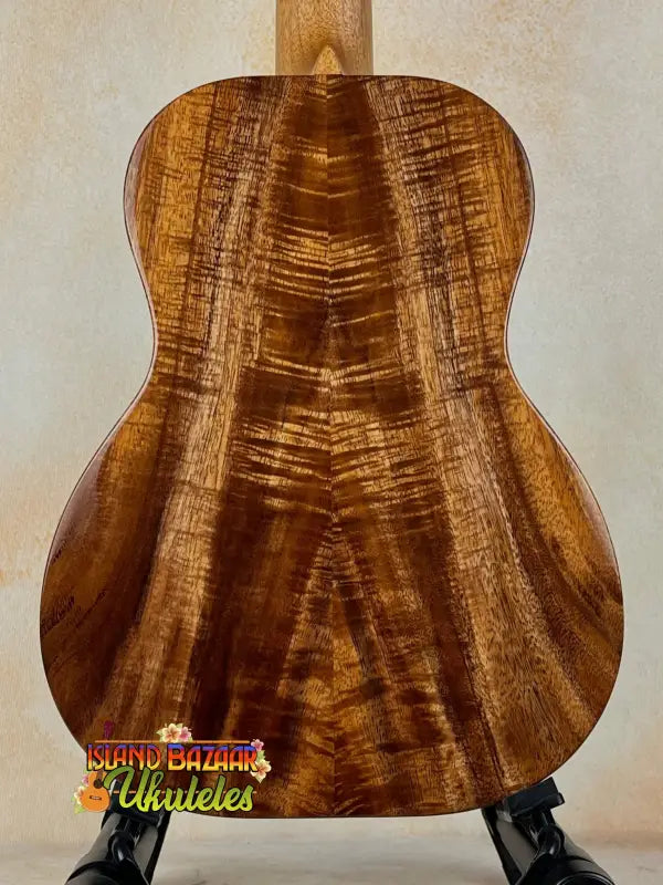 Acoustic guitar featuring premium Koa wood back panel from Kanile’a Hawaiian Islands