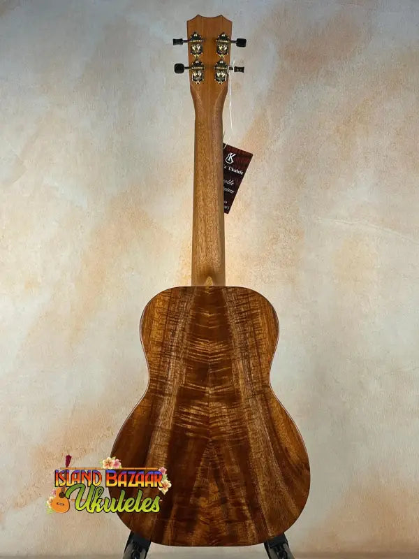 Kanile’a Hawaiian Islands Tenor Ukulele crafted from premium Koa wood in rich brown tones