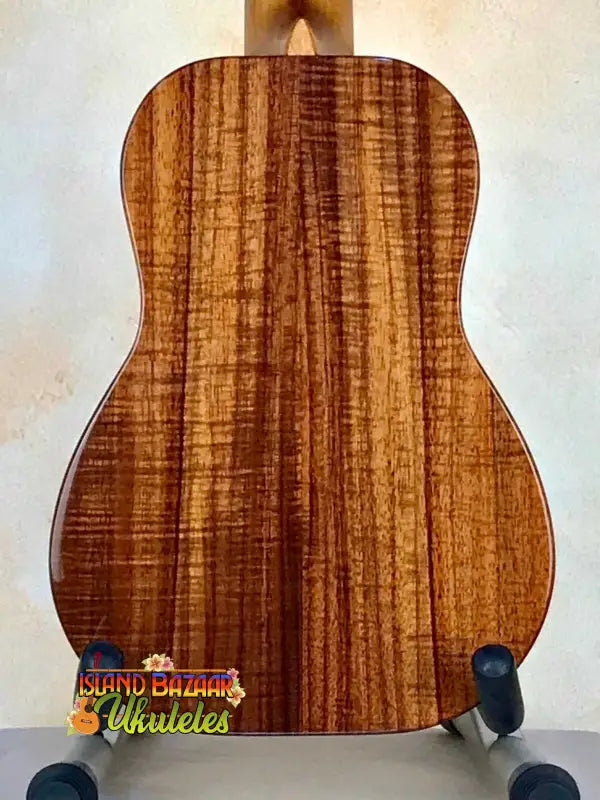 Kanile’a HNS-T-PREM Concert Ukulele with striking curly koa back and padded gig bag