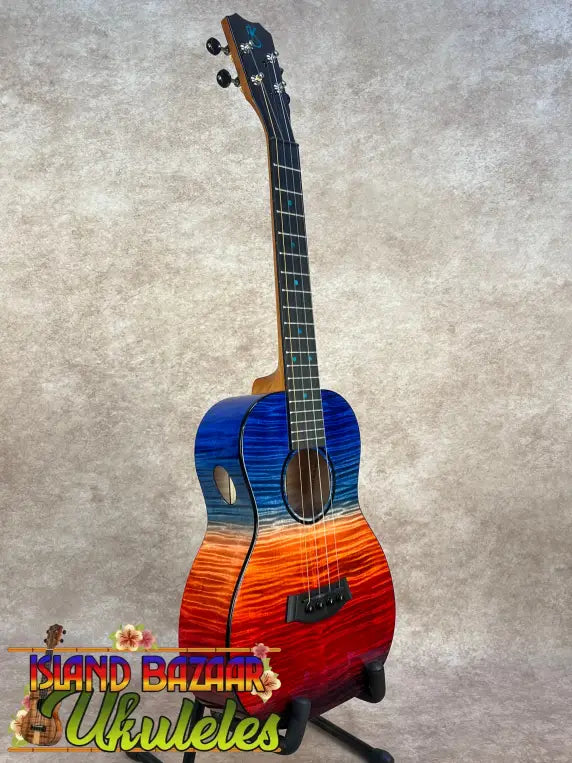 Kanile’a Ilikai T Pro tenor ukulele with vibrant blue-to-orange flame maple finish