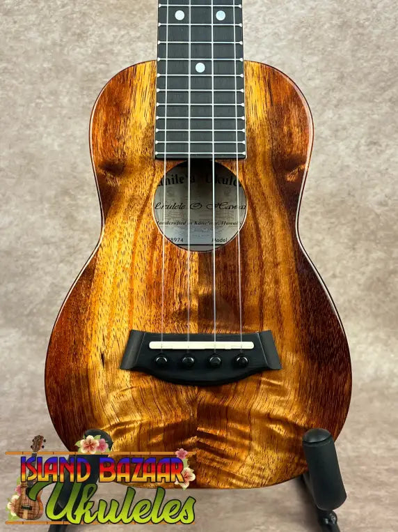 Glossy dark wood Kanileʻa K-1 Soprano Ukulele with Tru-R Bracing and premium Hawaiian Koa