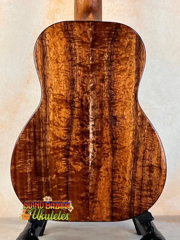 Kanile’a K3-T Tenor Koa Ukulele showcasing a stunning figured koa wood back panel