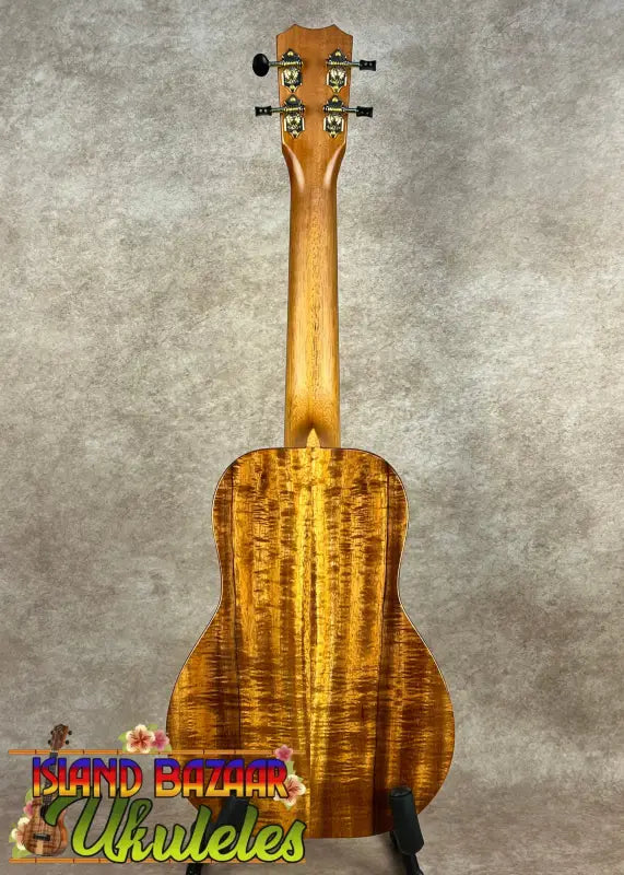 Wooden ukulele with flamed Hawaiian Koa grain on Kanileʻa KPA-C Master Concert Ukulele