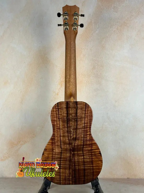 Wooden Kanilea KPA-C Master Concert Ukulele featuring beautiful Hawaiian Koa grain patterns