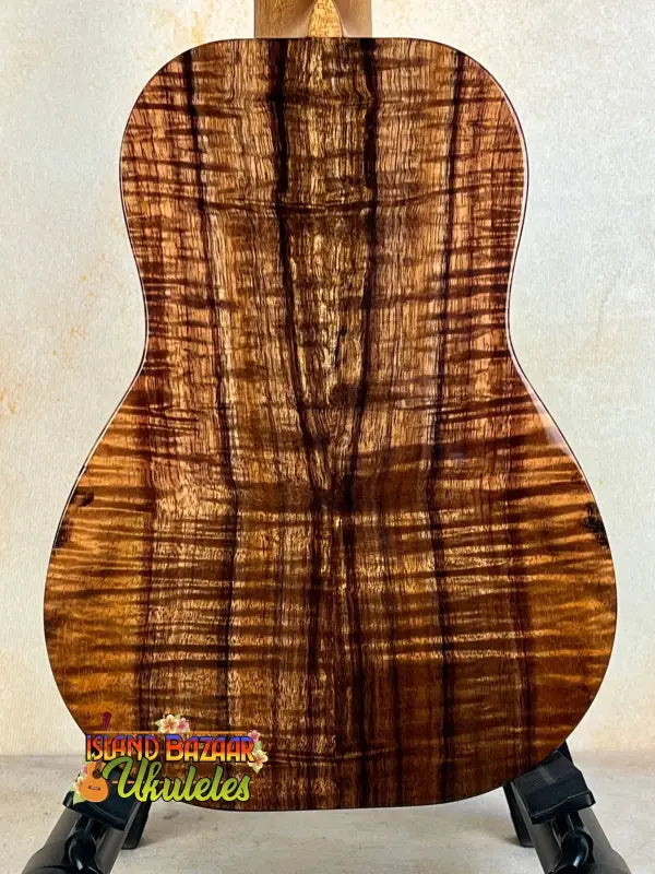 Acoustic guitar featuring beautiful figured Koa wood back, part of Kanilea KPA-C Master series