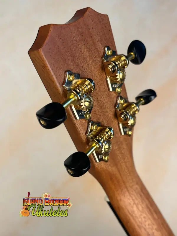 Guitar headstock with brass tuning pegs on Kanilea KPA Master-Grade Tenor Ukulele