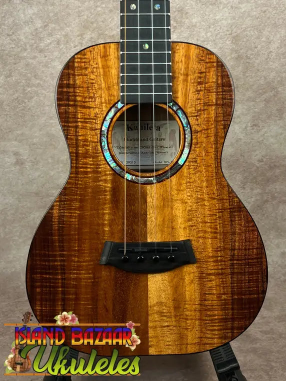 Koa wood KPA Pro Tenor Ukulele with glossy finish, abalone rosette, and black bridge