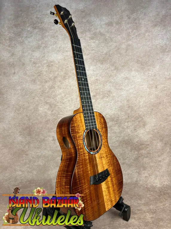 Glossy dark brown KPA Pro Tenor Koa Ukulele with black fretboard and tuning pegs