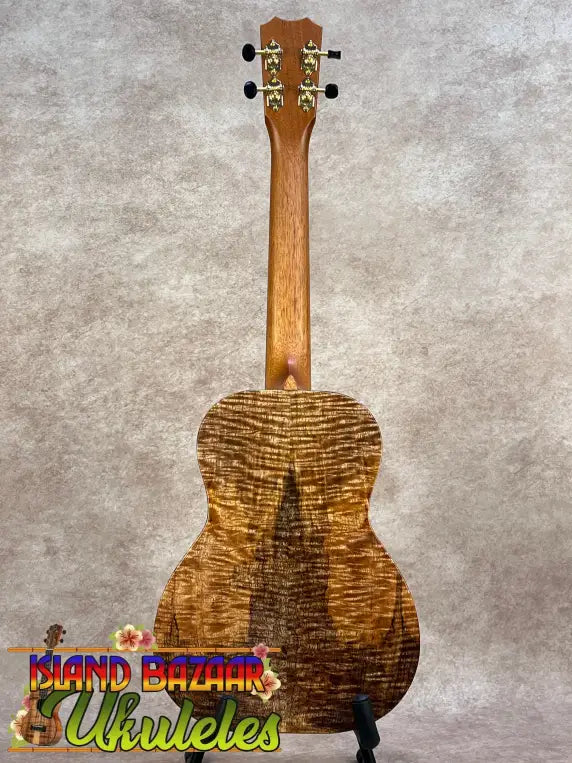 Kanileʻa kpa pro tenor ukulele with premium solid hawaiian koa wood and golden-brown finish with rich grain pattern