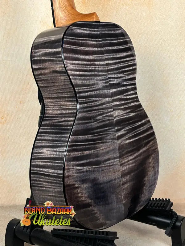 Black and gray Kanile’a Pohaku Pro Model Tenor Ukulele with Deluxe Gig Bag