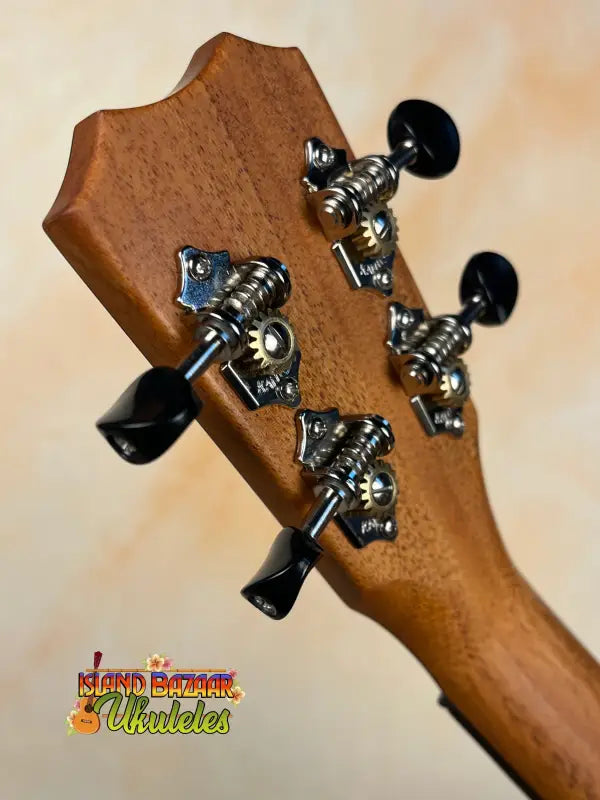 Ukulele headstock with tuning pegs on Kanile’a KPA Pro Tenor Ukulele with Deluxe Gig Bag