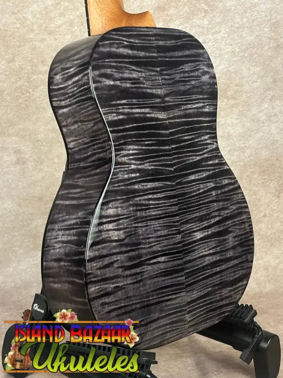 Black and gray Kanileʻa Pōhaku T Pro Tenor Ukulele made of solid maple with deluxe gig bag