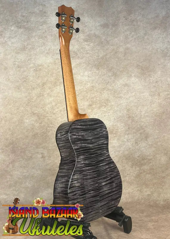 Black and gray Kanileʻa Pōhaku T Pro Tenor Ukulele made of solid maple with deluxe gig bag