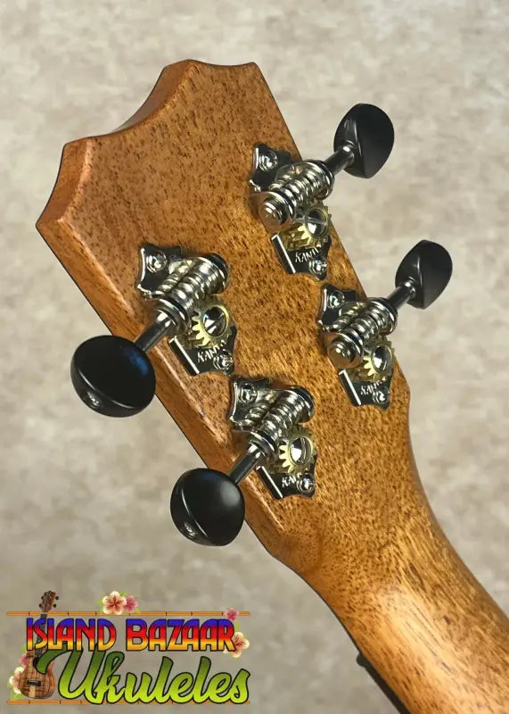 Ukulele headstock with tuning pegs on Kanileʻa Pōhaku T Pro Tenor Ukulele solid maple