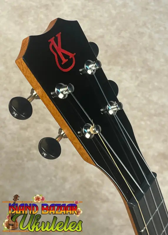 Ukulele headstock with tuning pegs on Kanileʻa Pōhaku T Pro Tenor Ukulele solid maple