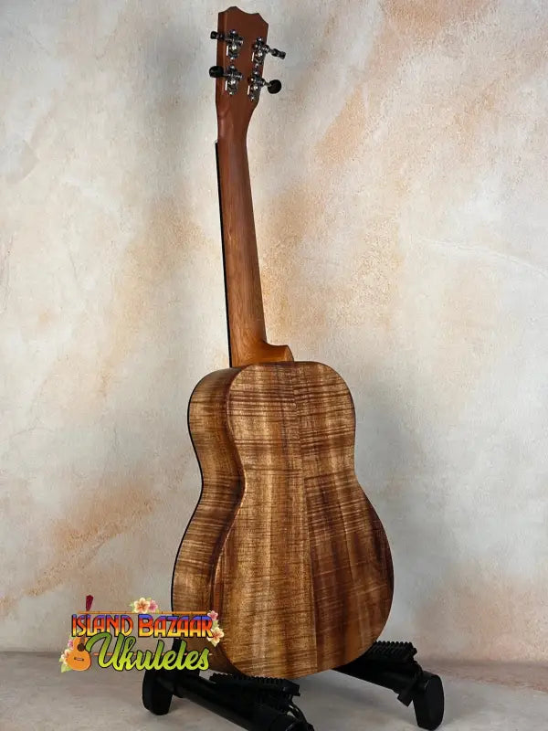 Acoustic guitar with figured Koa wood, featured in Kanile’a K-2 Premium Koa Tenor Ukulele