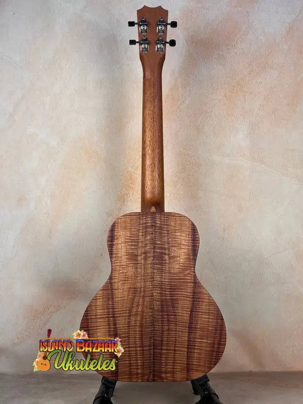 Wooden Kanile’a Super Tenor Ukulele featuring premium Koa with striped grain patterns