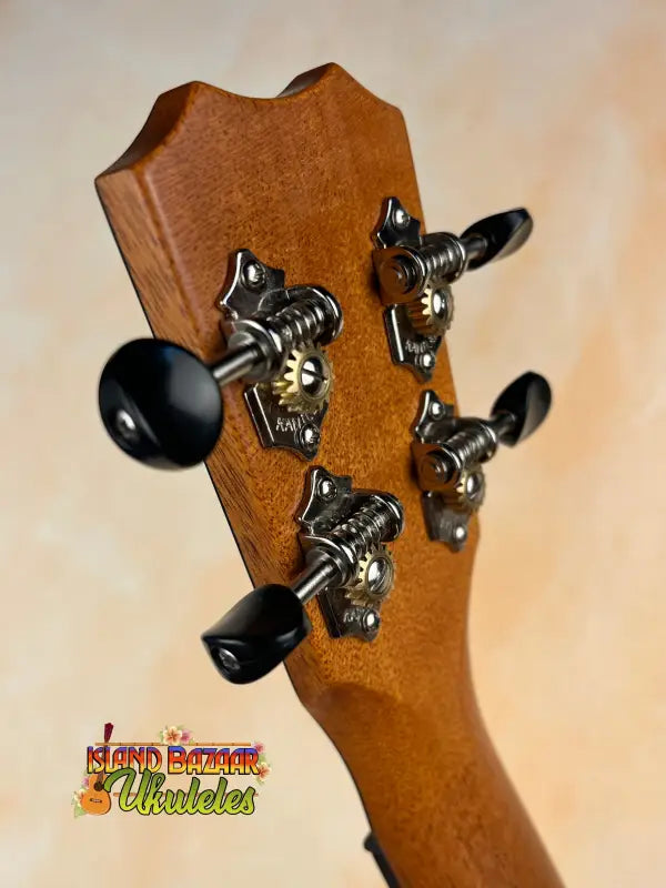 Ukulele headstock with tuning pegs from Kanile’a Tenor D-1 in Solid Hawaiian Koa