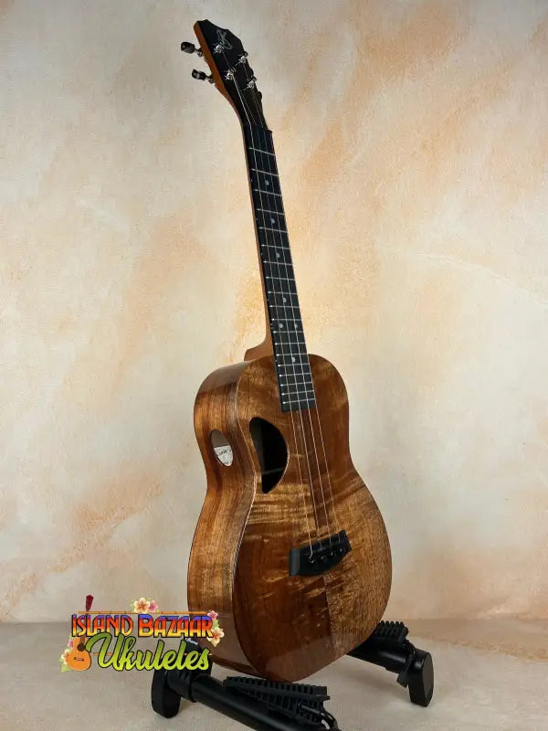 Brown wooden ukulele Kanile’a Tenor D-1 with solid Hawaiian Koa and deluxe gig bag