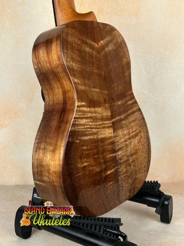 Glossy brown Kanile’a Tenor D-1 with solid Hawaiian Koa and deluxe gig bag