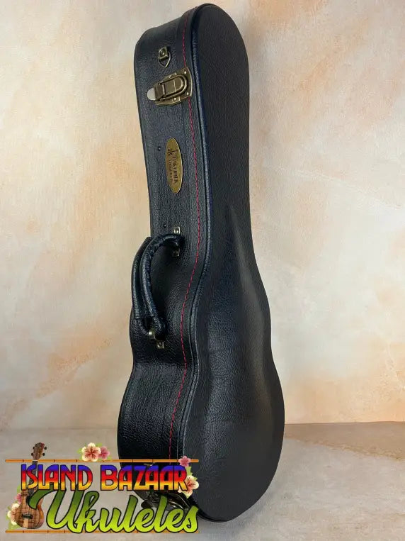 Black hardshell guitar case with brass latches for KoAloha Concert Hawaiian Ukulele