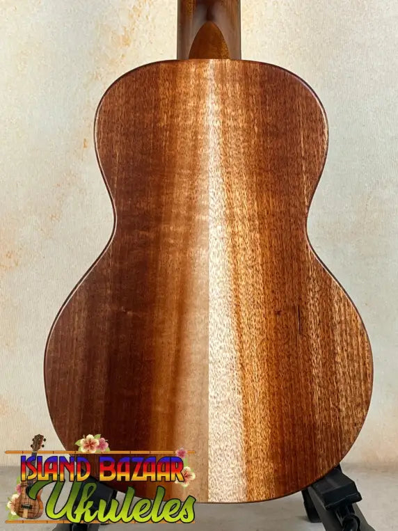 KoAloha KCM-10RP Concert Ukulele with rich brown wooden back and satin-finish Koa