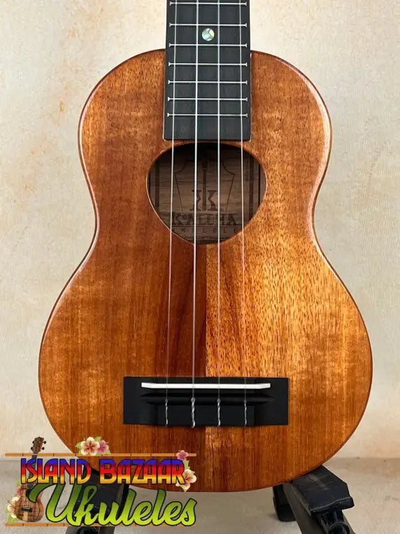 Wooden soprano ukulele with solid Hawaiian koa finish, KoAloha KSM-00 featured model